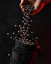 Steel balls pouring into ammo pouch